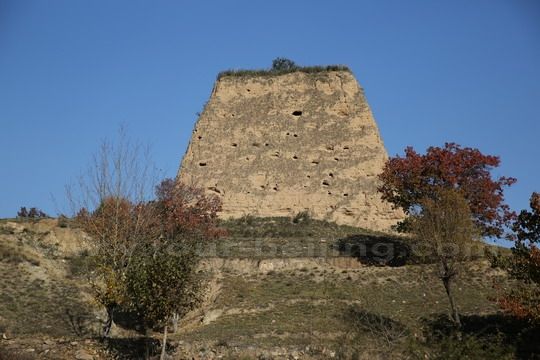 A lonely beacon tower stands on the hill 