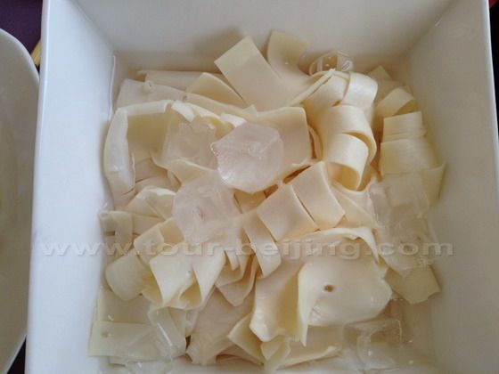 A plate of sliced beef throats