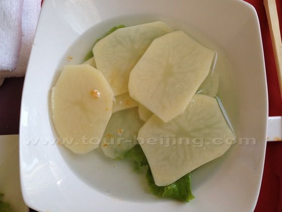 A plate of slices potatos