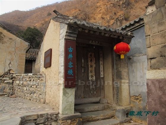 An entrance to a courtyard, now used as a homestay to boost loal accommodations and rual tourism. 