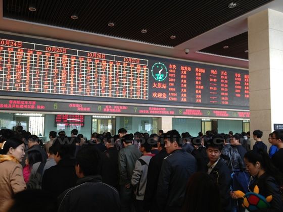 Buying train tickets in the ticketing hall