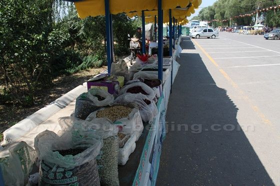 By the parking lot, local villlages sell the local specialities.