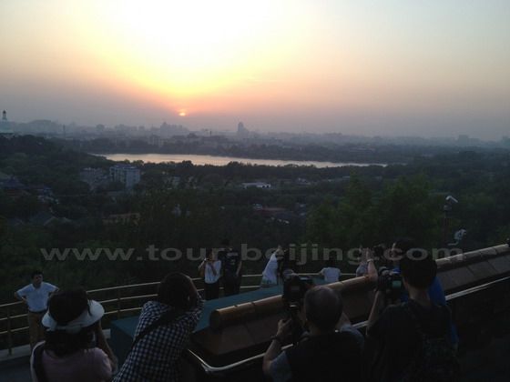 Concentrating on capturing the beautiful sunset