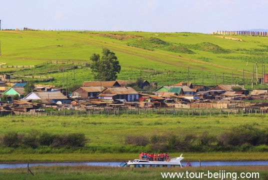 Zoom in for a close look at the village on the Russian side.