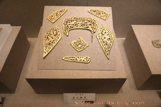 The gold saddles on display.