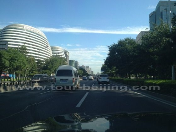 The round buildings on the left of the secong ring road is Galaxy Soho.