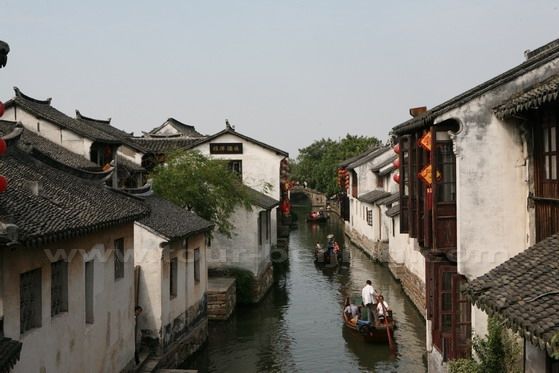 Overlooking the river sandwiched by the traditional houses from a bridge