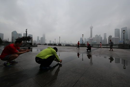 Rainwater reflections of Pudong Skyline on the Bund （6）