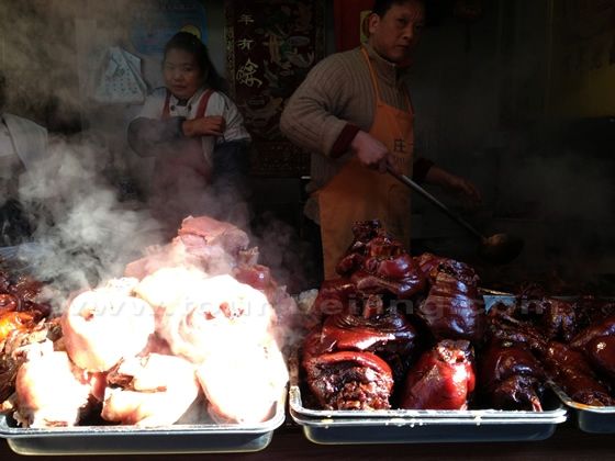 Sample its famous red-braised pork