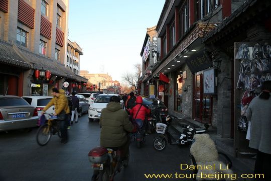 The 600-meter stone paved street is very busy.