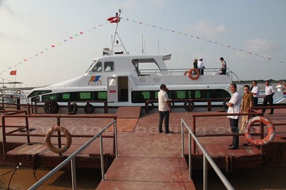 The boat has two-connected cabins and an upper sightseeing deck