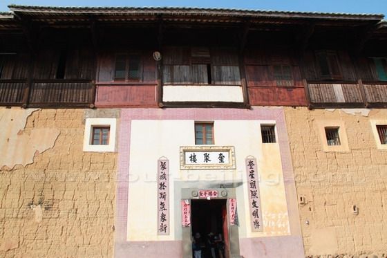 The entrance to the square Kuijulou tulou building