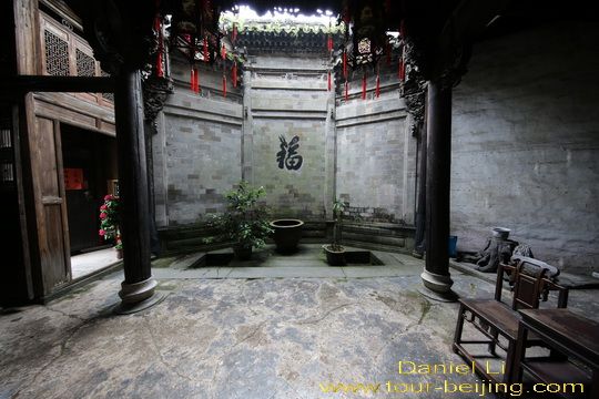 The front hall with a small yard