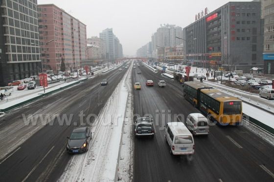The main street with pavement anti-freezing agent