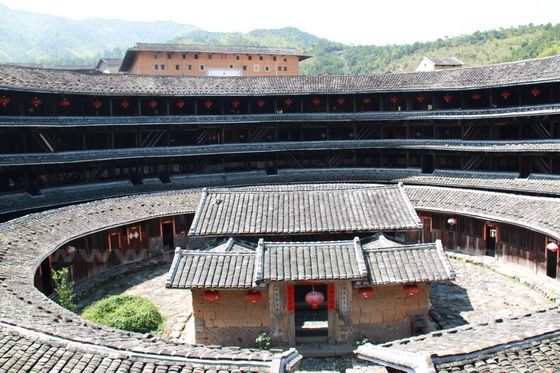 The outer ring has four storeys while the inner ring has just one story. The center is the clan temple.