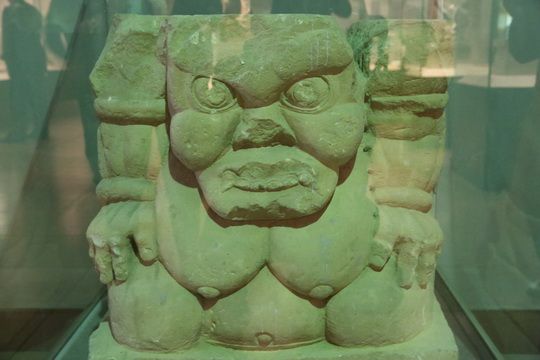 The stone pedestal of a figure