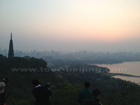 The thin haze delays the rising of the sun for about 10 minutes.