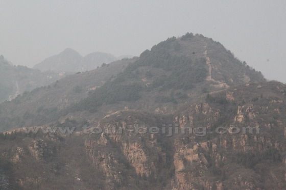 To the west of the Village across the valley, we find the distant Great Wall still visible on the high mountain.