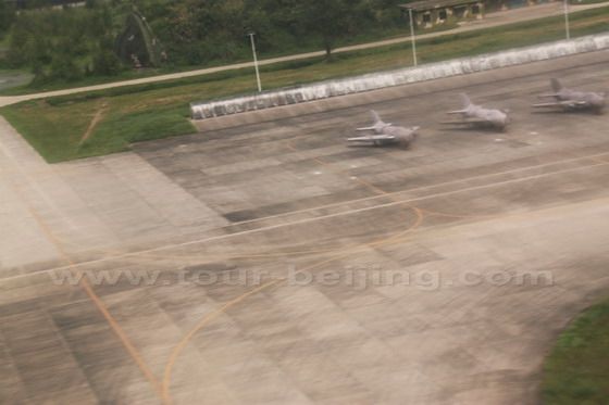 We are flying over a squad of fight planes.