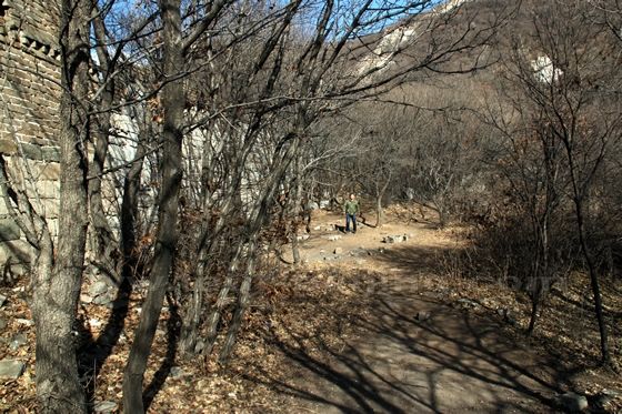 We walk off the wall and take a short cut by walking a dirt path