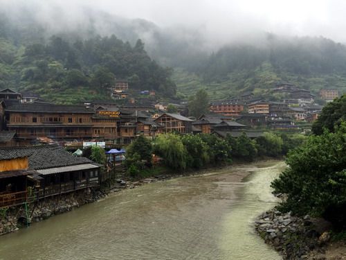 The wooden houses on the southern side of the valley
