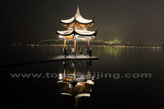 a close-up view of Jixian Pagoda protruding into the water