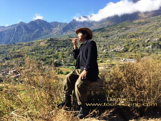 smoking and enjoying his bucolic life