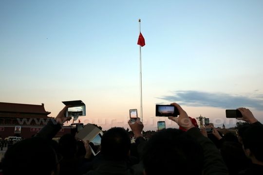 Watching the Red-Flag Lowering Ceremony