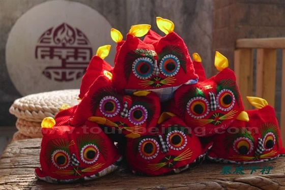 Locally made shoes for babies known as tiger-headed shoes