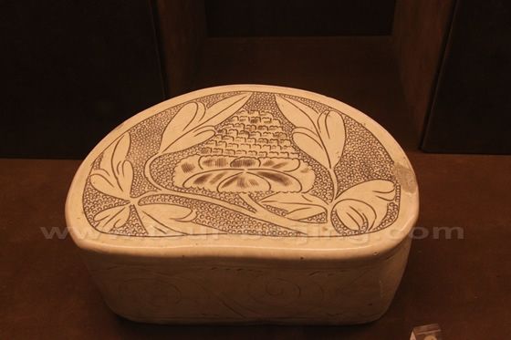 Pillows with the design against a ring-matted ground 