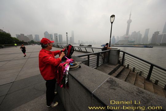 Early Morning Kite Flyers on the Bund in Shanghai