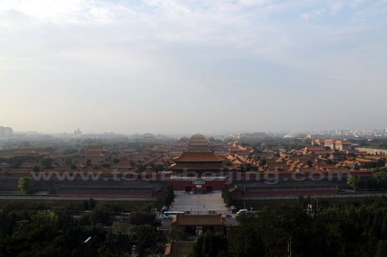 the massive Forbidden City looking brilliantly under a radiant rising sun.