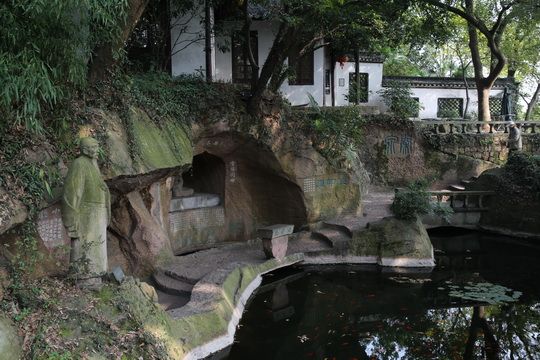 the pool and a hole connected to the other side of the hill